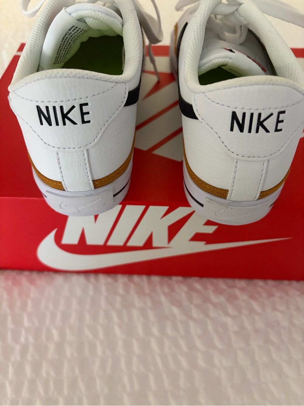 Nike Women’s White Sneakers with Black Swoosh and Brown Trim - Picture 6 of 9